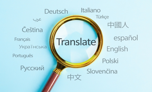 Magnifying glass over "Translate" with multilingual text on light blue background.