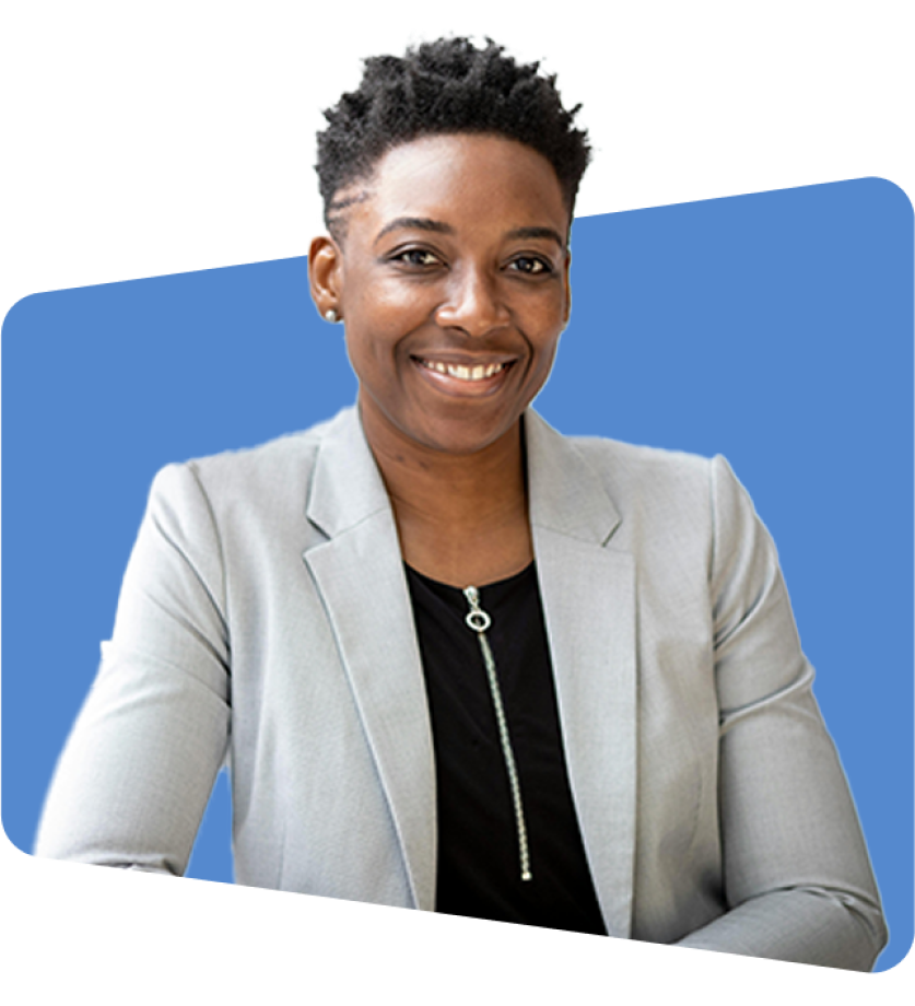 Smiling person in gray blazer against blue background, photo style, no text.