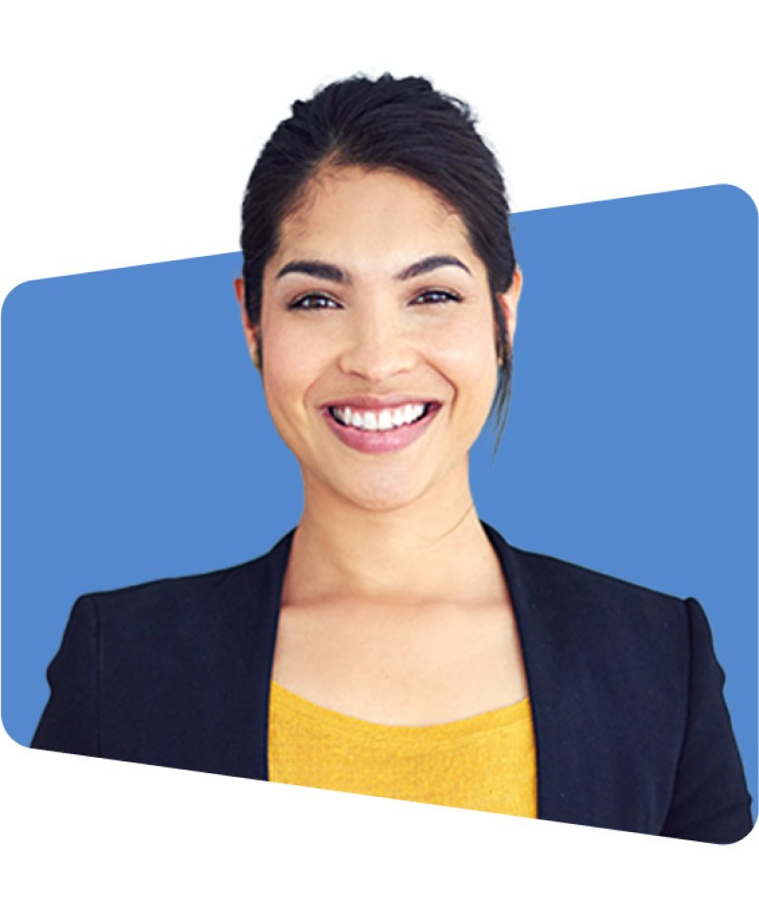 Smiling woman in a black blazer against a blue background, photo.